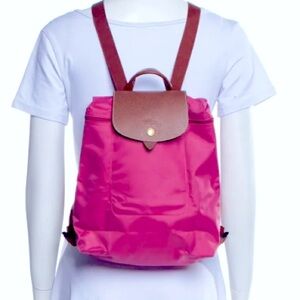 Longchamp Raspberry and brown leather backpack used